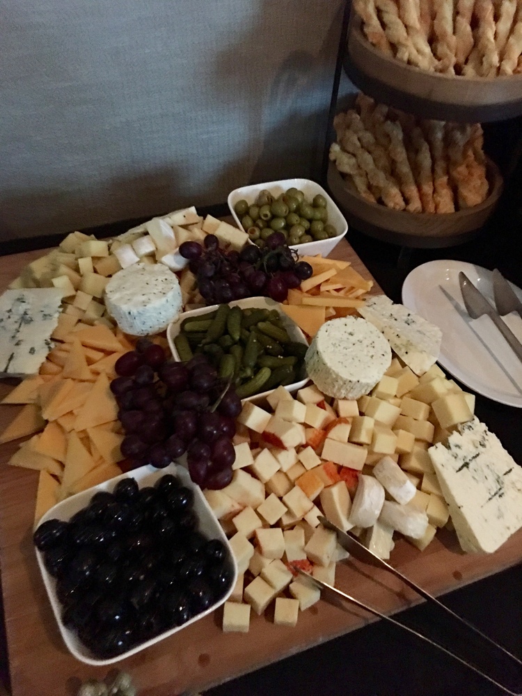 grapes, black and green olives, cheese and pickles